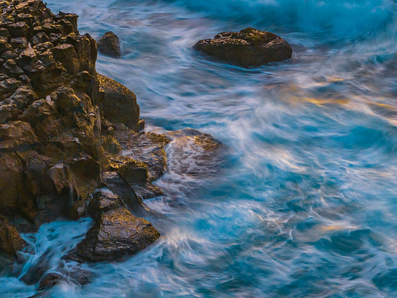 Dawn at the seaside with cascades over the rock platform