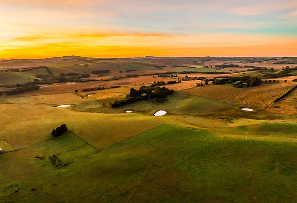 High-Cloud Sunrise Over Rural Landscapes on the Edge of a Countr