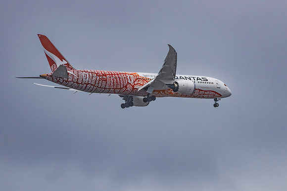 Qantas Spirit of Australia aircraft flying in the afternoon sky