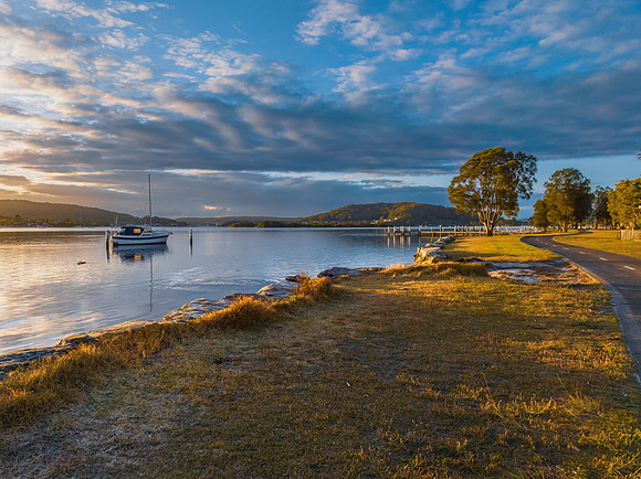 Early morning light over the bay with clouds