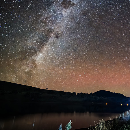 Aurora Australis diffuse in the night sky with The Milky Way