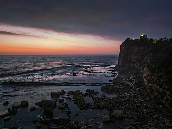 Hazy Summer Sunrise Seascape and Rocky Inlet