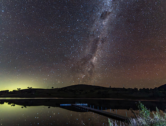 Aurora Australis diffuse in the night sky with The Milky Way