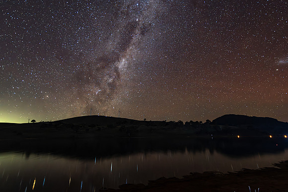 Aurora Australis diffuse in the night sky with The Milky Way