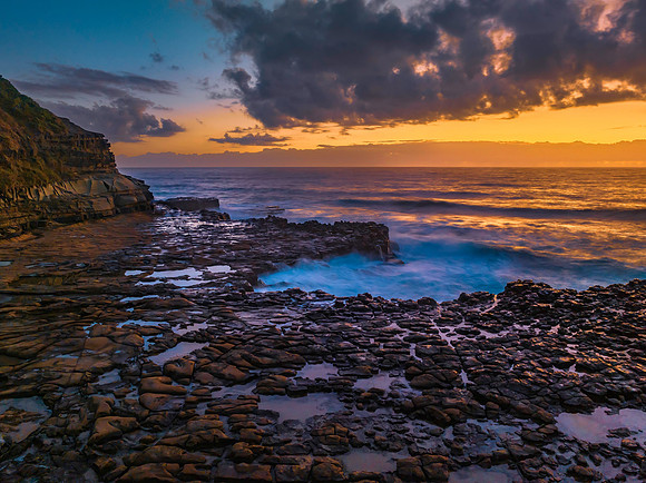 Dawn at the seaside and rock platform