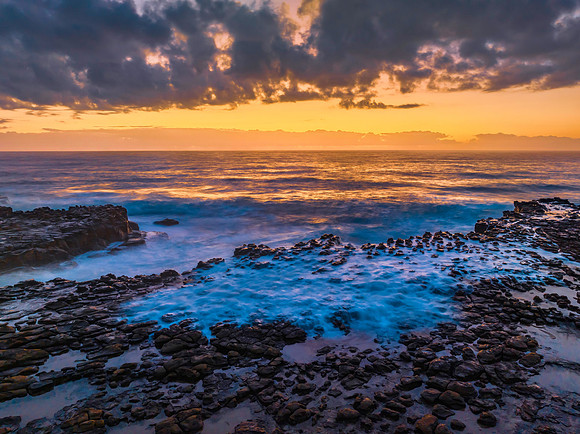 Dawn at the seaside and rock platform