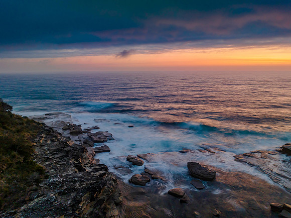 Hazy Summer Sunrise Seascape and Rocky Inlet