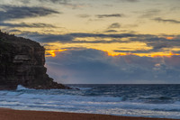 Seaside Sunrise with a hint of rain in the clouds