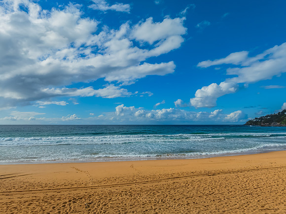 Morning views at the seaside with clouds and a blue sky
