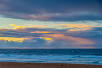 Seaside Sunrise with a hint of rain in the clouds