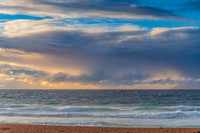 Seaside Sunrise with a hint of rain in the clouds