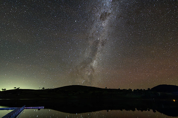 Aurora Australis diffuse in the night sky with The Milky Way
