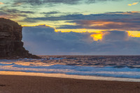 Seaside Sunrise with a hint of rain in the clouds
