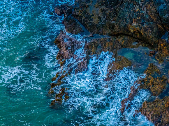 McKenzies Beach Sunrise over the sea and rocks