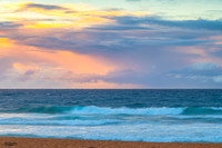 Seaside Sunrise with a hint of rain in the clouds