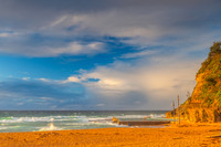 Seaside Sunrise with a hint of rain in the clouds
