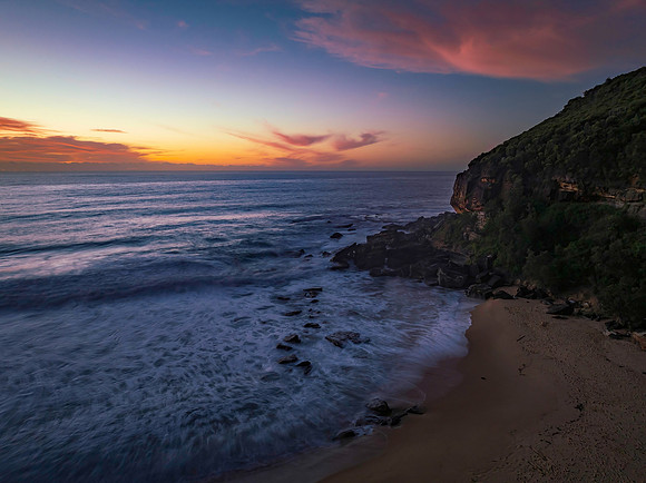 Sunrise at the seaside with pretty clouds