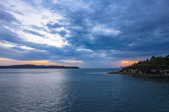 Cloudy sunrise seascape as a storm moves on