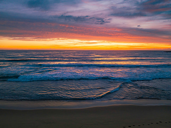 Sensational high cloud sunrise at the seaside