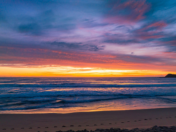Sensational high cloud sunrise at the seaside