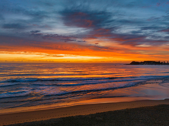 Sensational high cloud sunrise at the seaside