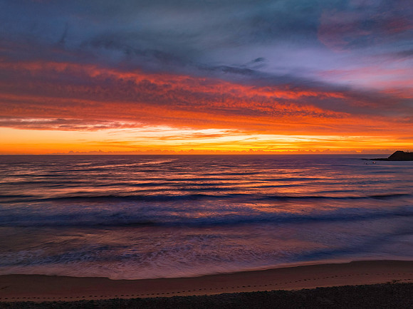 Sensational high cloud sunrise at the seaside