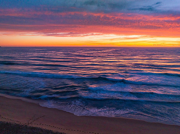Sensational high cloud sunrise at the seaside