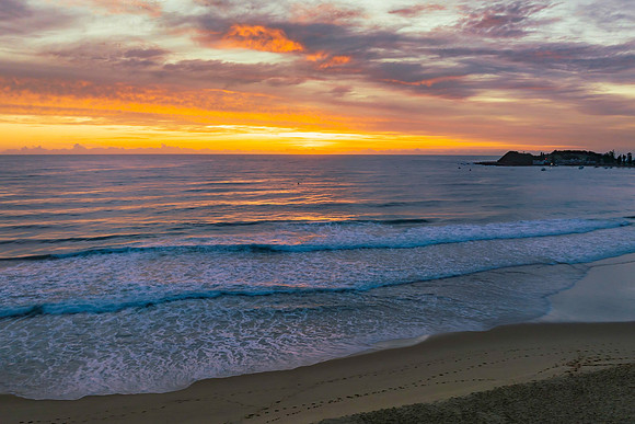 Sensational high cloud sunrise at the seaside