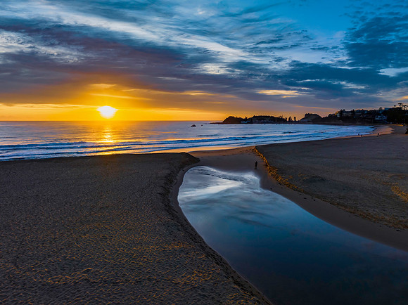 Sensational high cloud sunrise at the seaside