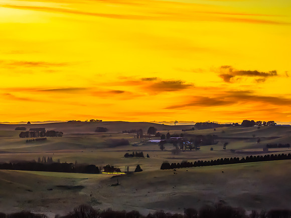 Winter Sunrise over the rural countryside with high cloud