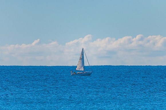 Calm Morning Sea Views and Boat at Palm Beach