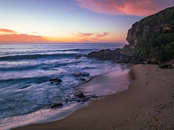 Sunrise at the seaside with pretty clouds