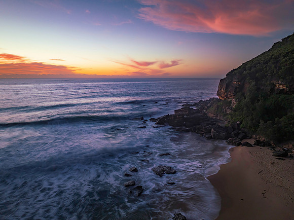 Sunrise at the seaside with pretty clouds