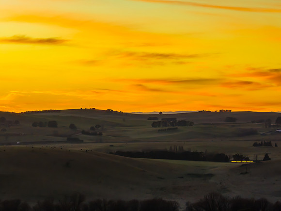 Winter Sunrise over the rural countryside with high cloud