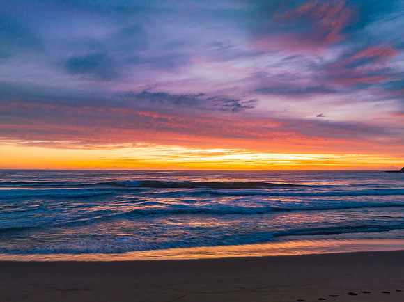 Sensational high cloud sunrise at the seaside