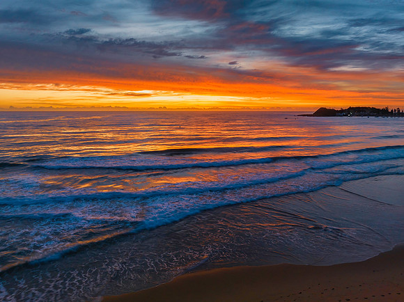 Sensational high cloud sunrise at the seaside