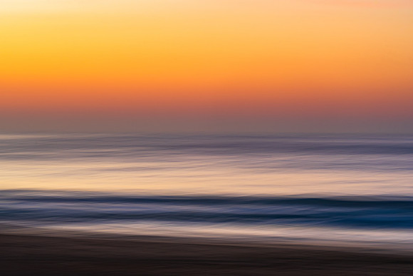 Soft and silky abstract sunrise at the seaside