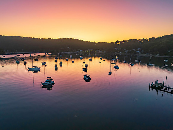 Sunrise waterscape over the bay nestled at the foot of the mount