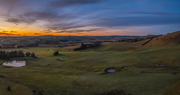 Winter Sunrise over the rural countryside with high cloud