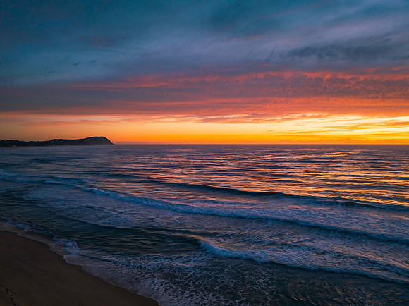 Sensational high cloud sunrise at the seaside