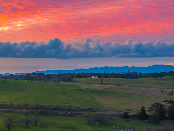 Sunset and clouds over the rural farmland