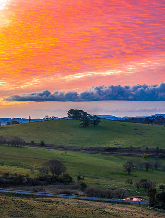 Sunset and clouds over the rural farmland