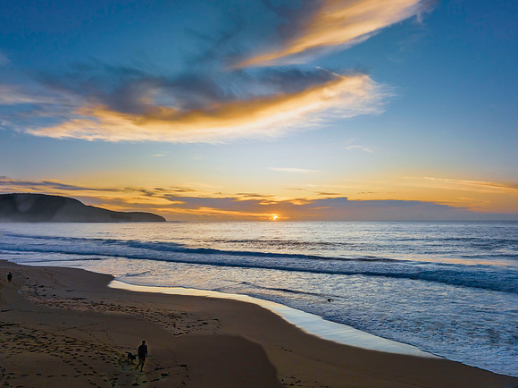 Sunrise at the seaside with pretty clouds
