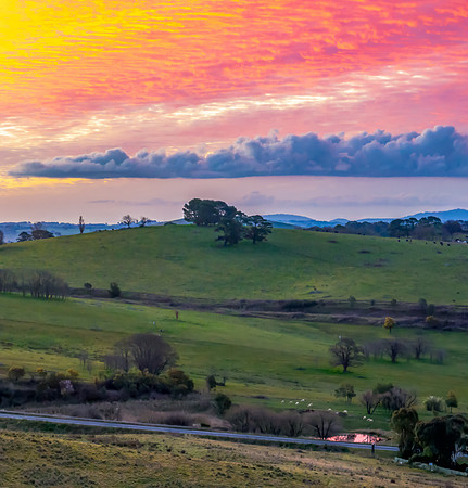 Sunset and clouds over the rural farmland