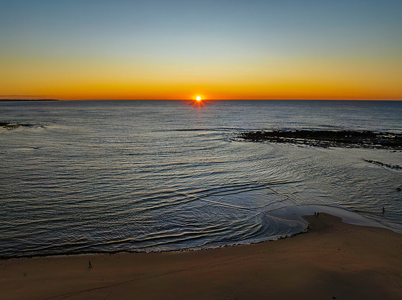 Aerial sunrise seascape with  clear skies