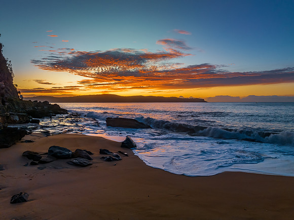 Aerial sunrise seascape with high cloud