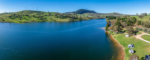Aerial scenic views over Carcoar Dam with blue sky