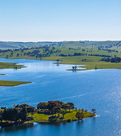 Aerial scenic views over Carcoar Dam with blue sky