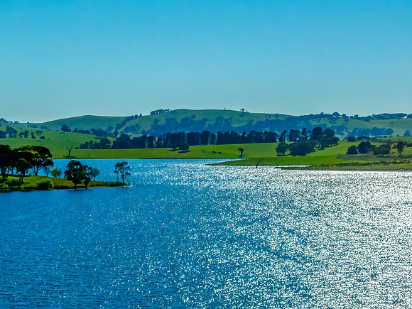 Aerial scenic views over Carcoar Dam with blue sky