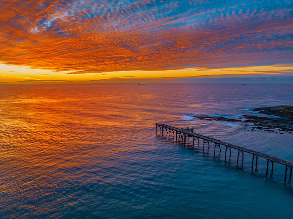 Sunrise at the seaside with beautiful cloudcover